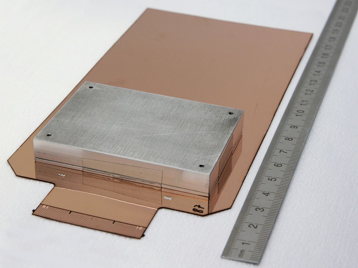 This image shows the unfolded envelope before it is wrapped around a hardware security module.