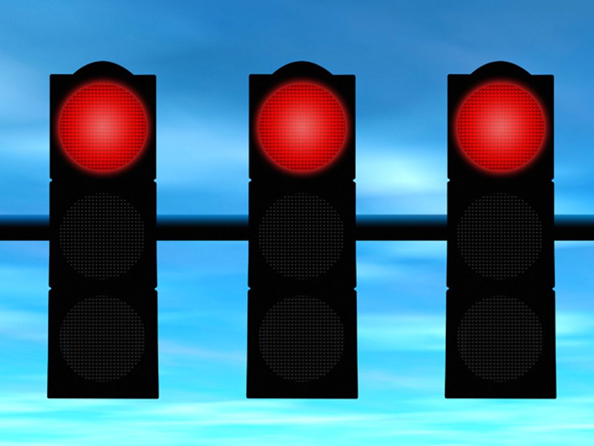 Three red traffic lights.