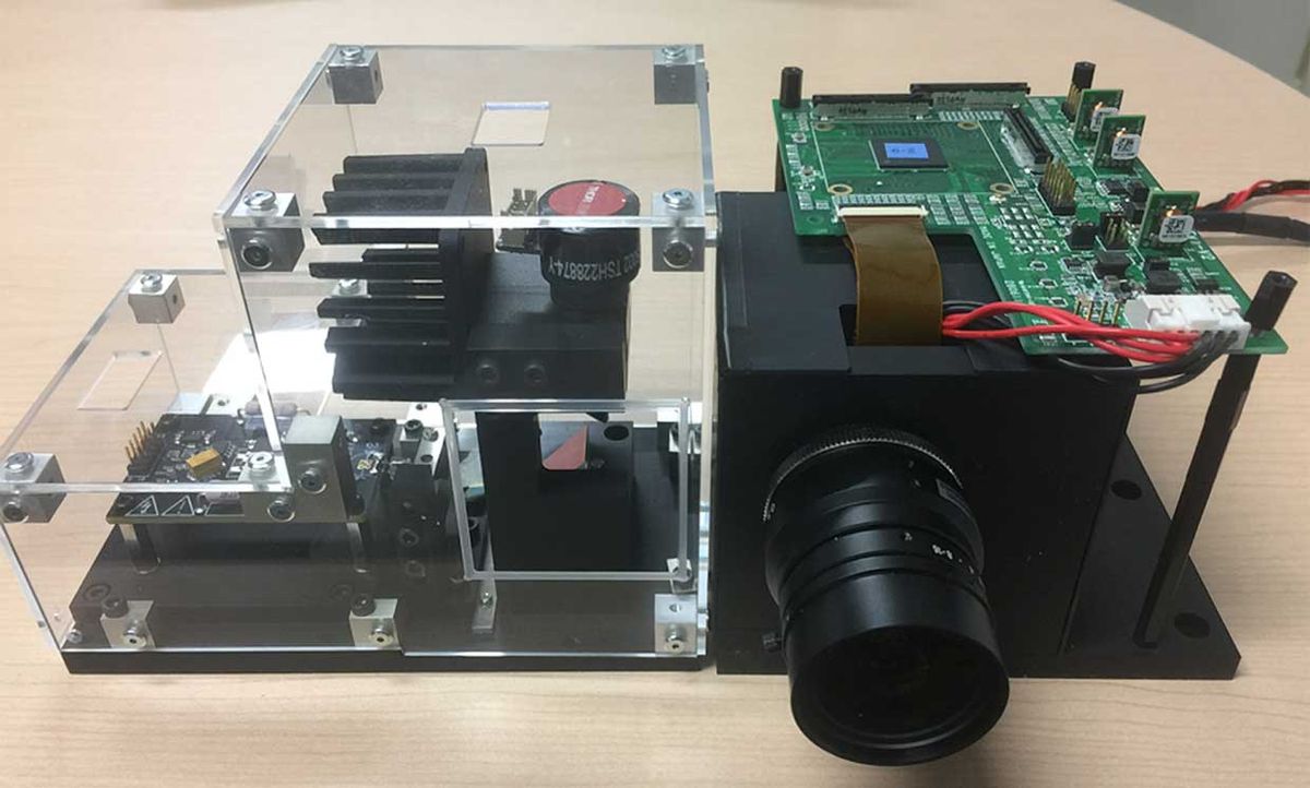 Toshiba’s prototype Lidar. Left, a Galvano scanner used for proof of concept. Right, a commercial telephoto lens and SiPM circuit board.