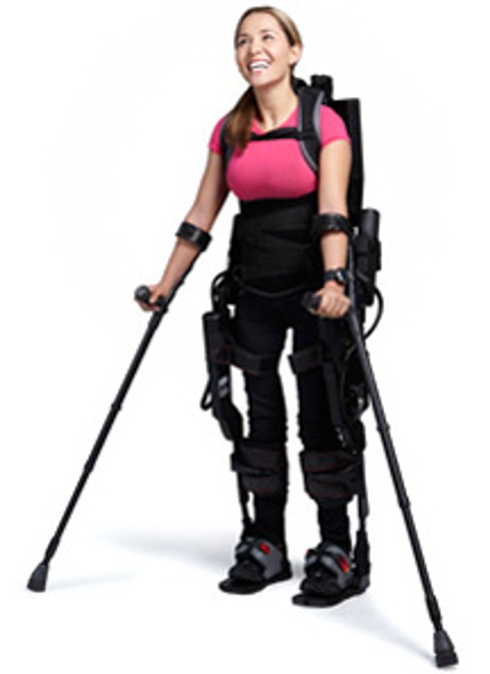 User Tamara Mena, who was paralyzed in 2005, gleefully puts her exoskeleton walking suit through its paces.