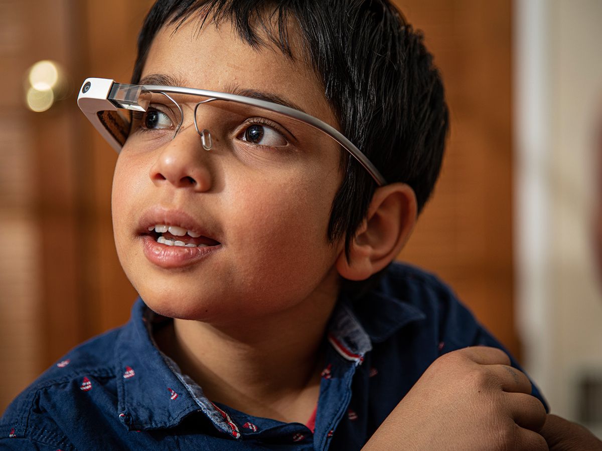 Vivaan Ferose, an 11-year-old boy with autism, wears his Google Glass head-up display.