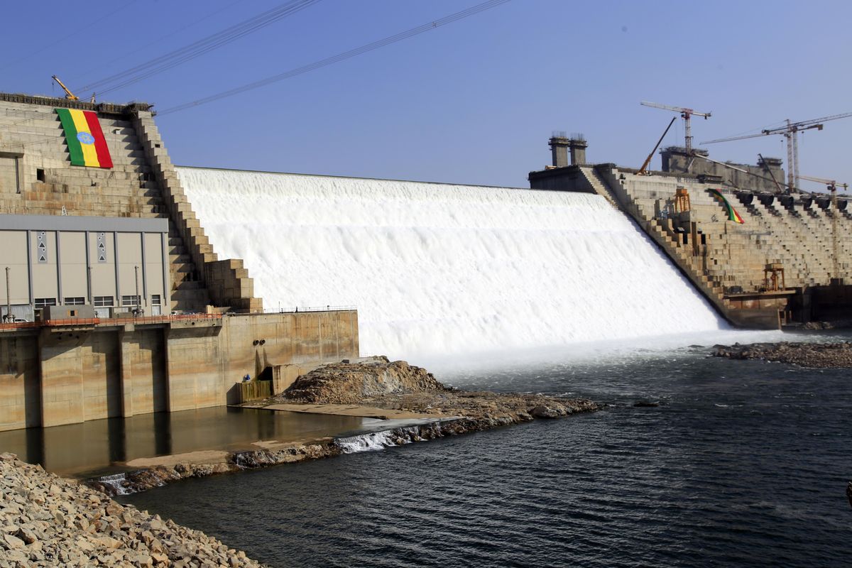 Water flows down a dam 