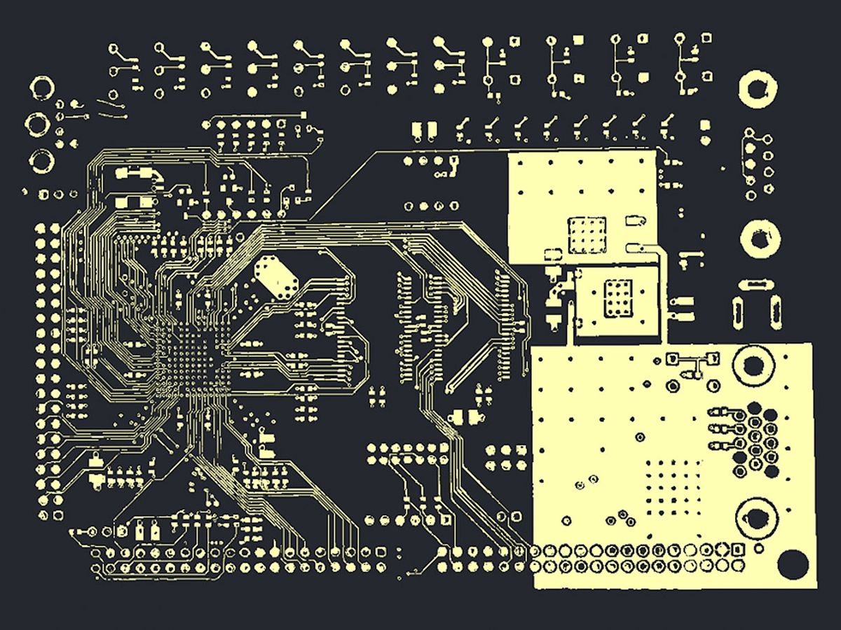 X-ray tomography image reveals a layer of the layout of a commercial printed circuit board.